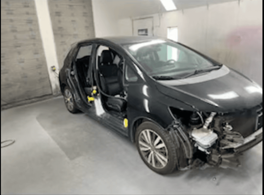 Honda Fit before — major side damage