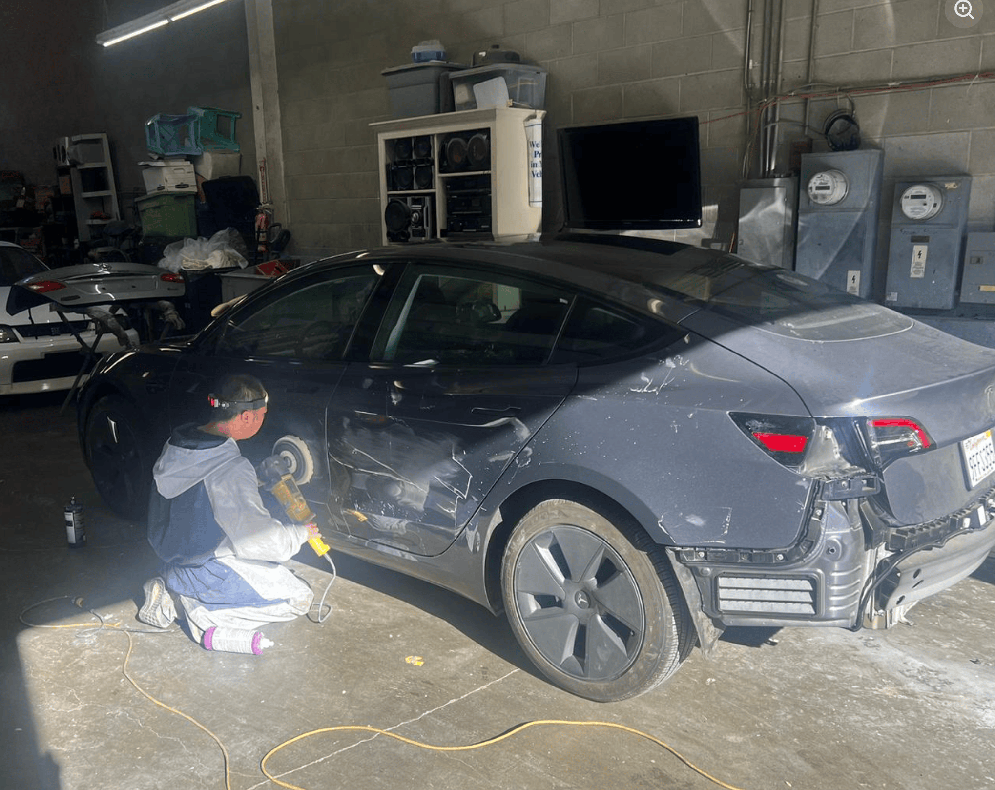 Tesla Model 3 before — rear quarter panel damage